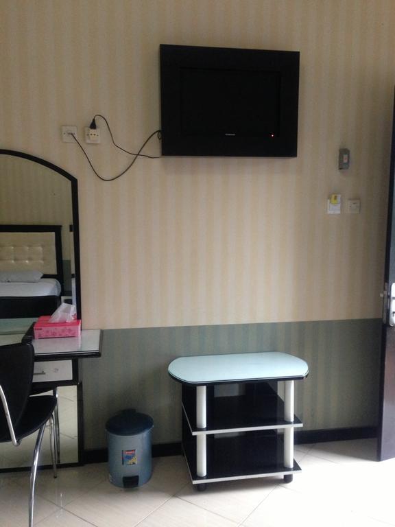 Global Inn Keluarga Sedati Oda fotoğraf