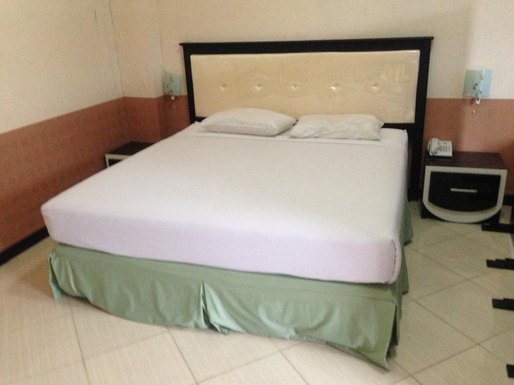 Global Inn Keluarga Sedati Oda fotoğraf