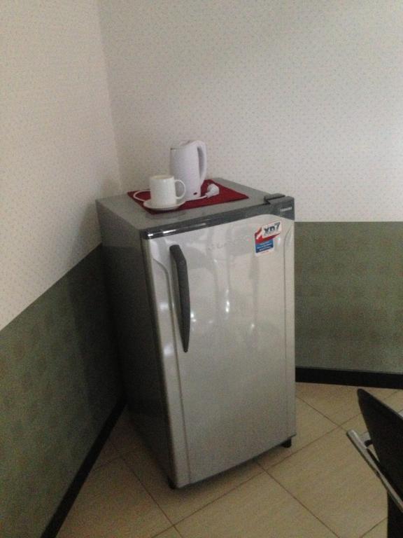 Global Inn Keluarga Sedati Oda fotoğraf