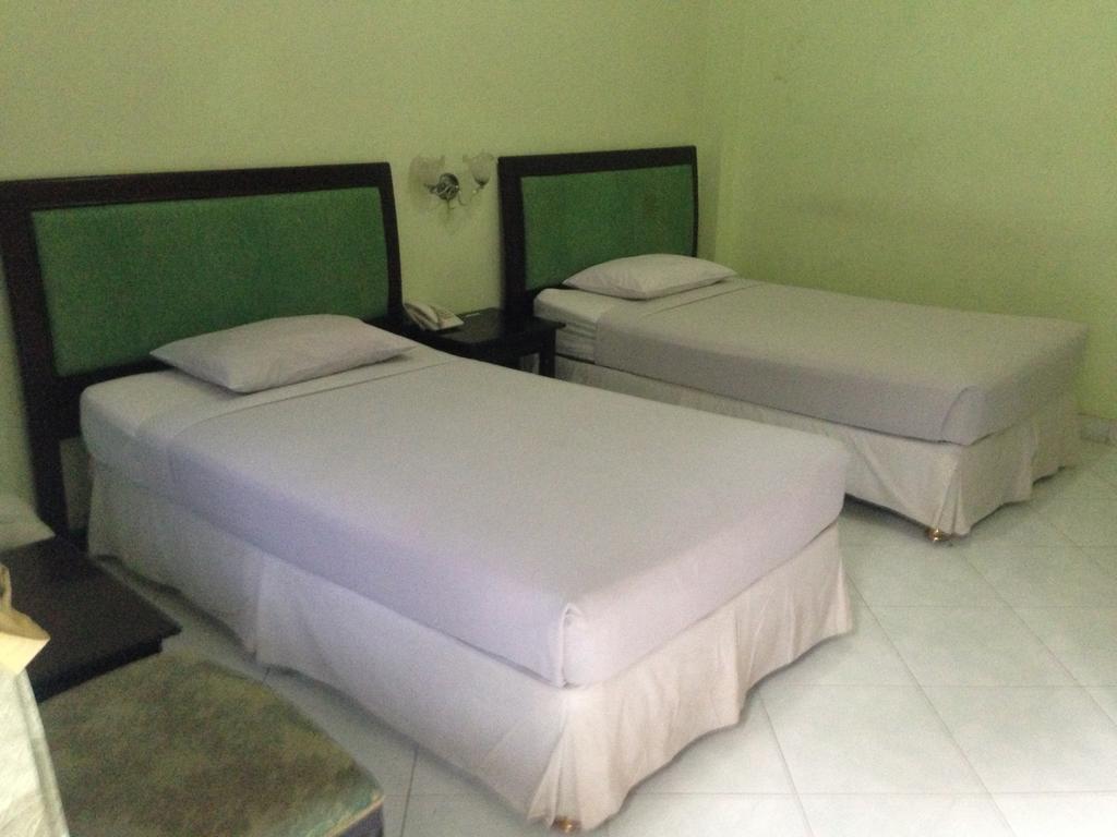 Global Inn Keluarga Sedati Oda fotoğraf